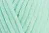 A close-up view of mint green yarn. Produktbild-Vorschau