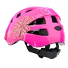 A pink children's bicycle helmet with white and pink flower and butterfly designs, shown from a side angle on a white background. Náhľad obrázku produktu