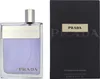 A bottle of Prada Amber Pour Homme Eau de Toilette spray and its packaging are displayed side-by-side against a white background. Náhľad obrázku produktu