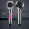 Two views of a gray hairdryer with pink accents and labels indicating features. Produktbild-Vorschau