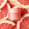 A LANEIGE Lip Sleeping Mask in Grapefruit flavor is shown, surrounded by slices of grapefruit. Produktbild-Vorschau