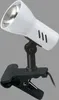 A white clip-on lamp with a black adjustable neck and clip. Produktbild-Vorschau