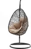 A black hanging egg chair with beige cushions, displayed on a white background. Náhled obrázku produktu