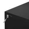 A close-up view of a black furniture piece, showing a metal bracket and a plastic wall anchor attached to its side. Produktbild-Vorschau