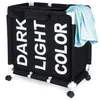 A black laundry basket with three compartments labeled 'DARK', 'LIGHT', and 'COLOR'. It has a white frame and wheels, and a blue towel is draped over the top right corner. Anteprima dell’immagine prodotto