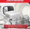 Kitchen appliance parts, including a basket and a container, are placed in a dishwasher rack. Produktbild-Vorschau