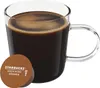 A glass mug filled with dark coffee sits next to a single coffee capsule. Produktbild-Vorschau