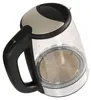 A close-up, top-down view of a glass electric kettle with a black handle and silver accents, set against a white background. Podgląd zdjęcia produktu