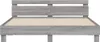 A bed frame with a headboard and wooden slats, shown against a white background. Produktbild-Vorschau