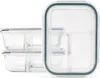 A set of three glass food storage containers with dividers and lids, stacked and viewed from a diagonal angle. Náhled obrázku produktu