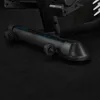 A close-up view of the base and wheels of a black exercise machine. Produktbild-Vorschau