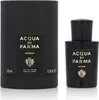 A black perfume bottle and its packaging are displayed against a white background. Voir les images du produit