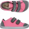 A top-down and side view of a pair of pink canvas sneakers with gray accents and velcro straps.