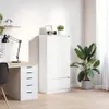 A minimalist home office setup with a desk and storage cabinet. Náhled obrázku produktu