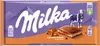 A Milka chocolate bar with caramel creme filling, shown on its packaging. Podgląd zdjęcia produktu
