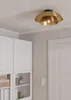 A ceiling light fixture is shown in a room with white cabinets and a white door. Produktbild-Vorschau