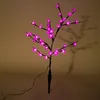A decorative LED tree with pink lights. Produktbild-Vorschau