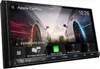 A car stereo system with a large touchscreen display showing the Apple CarPlay interface and a dynamic background image of cars on a road. Produktbild-Vorschau