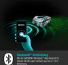 A robotic lawnmower is shown on grass, with a smartphone in a hand displaying a GARDENA app interface, connected via Bluetooth. Produktbild-Vorschau