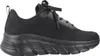 A black Skechers sneaker is shown from the side against a white background. Voir les images du produit