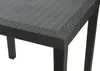 A close-up view of the corner of a dark gray table with a rattan-like texture on the edges. Produktbild-Vorschau