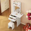 A white vanity table with drawers and a mirror, a white stool, and decorative items like balloons and gift boxes. Produktbild-Vorschau