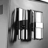 A close-up shot of the side of a coffee machine, focusing on the milk frothing nozzles. Produktbild-Vorschau
