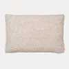 A rectangular, textured cushion cover in a light cream color, presented flat against a white background. Anteprima dell’immagine prodotto