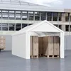 A white tent garage structure is shown outdoors, with stacks of cardboard boxes on pallets inside. A building with large windows is in the background. Produktbild-Vorschau