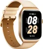 A close-up studio shot of a smartwatch with a gold casing and a beige leather strap, displayed against a white background. The watch face shows the time and battery status. Podgląd zdjęcia produktu
