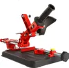 A red and black angle grinder stand is shown against a white background. Anteprima dell’immagine prodotto