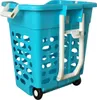 A blue laundry basket with white handles and wheels, shown from a side angle. Produktbild-Vorschau
