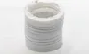 A white flexible hose coiled up on a white background. Produktbild-Vorschau