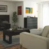 A living room scene with a black dresser, coffee table, and sofa. Anteprima dell’immagine prodotto