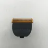 A close-up, top-down view of a hair clipper blade attachment on a white background. Anteprima dell’immagine prodotto