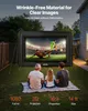 A family is watching a movie on an inflatable screen in their backyard at dusk. Voir les images du produit