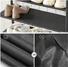 A collage showing a shoe rack with shoes and close-ups of fabric textures. Produktbild-Vorschau