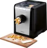 A pasta machine is shown with fresh pasta coming out of it and some pasta on a wooden board in front of it. Produktbild-Vorschau