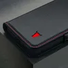 Close-up of a black leather phone case with red stitching and a red bull logo. Anteprima dell’immagine prodotto