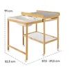 A baby changing table with an integrated bath tub, shown from a diagonal angle on a white background. Produktbild-Vorschau