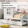A white wooden children's bed with drawers underneath, showing bedding and a stuffed animal. Anteprima dell’immagine prodotto