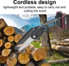 A cordless chainsaw is shown in use, cutting through logs in a natural outdoor setting with trees and mountains in the background. Podgląd zdjęcia produktu
