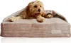 A dog is resting in a dog bed. Produktbild-Vorschau