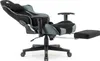 A black and gray gaming chair with an extended footrest is shown against a white background. Náhled obrázku produktu