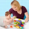 A mother and child are playing with a bath toy in a bathtub. Podgląd zdjęcia produktu