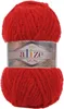 A ball of red yarn with a label. Produktbild-Vorschau