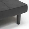 A close-up view of the corner of a gray sofa bed, showing the upholstered cushion and one of its dark, cylindrical legs. Voir les images du produit