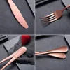 A collage of four close-up images showing different pieces of copper-colored cutlery, including a knife, fork, and spoons, with a strawberry and blueberry in one of the images. Voir les images du produit