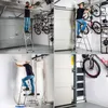 A collage of four images showing a man using a ladder in a garage, a man painting a wall, and bicycles stored in a garage. Náhľad obrázku produktu