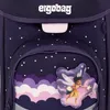A close-up view of a purple backpack with a starry night pattern and a fairy graphic. Podgląd zdjęcia produktu
